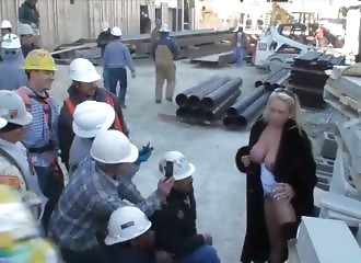 Blonde shows off her panties to construction workers